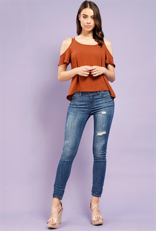 Distressed Mid-Rise Skinny Jeans