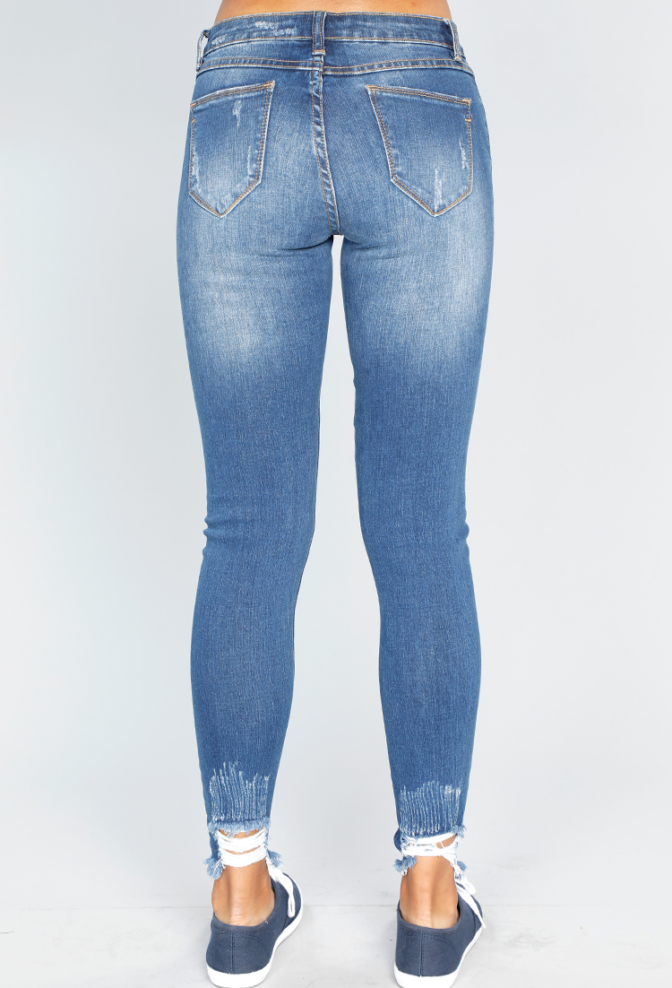Distressed Mid Rise Denim Jeans