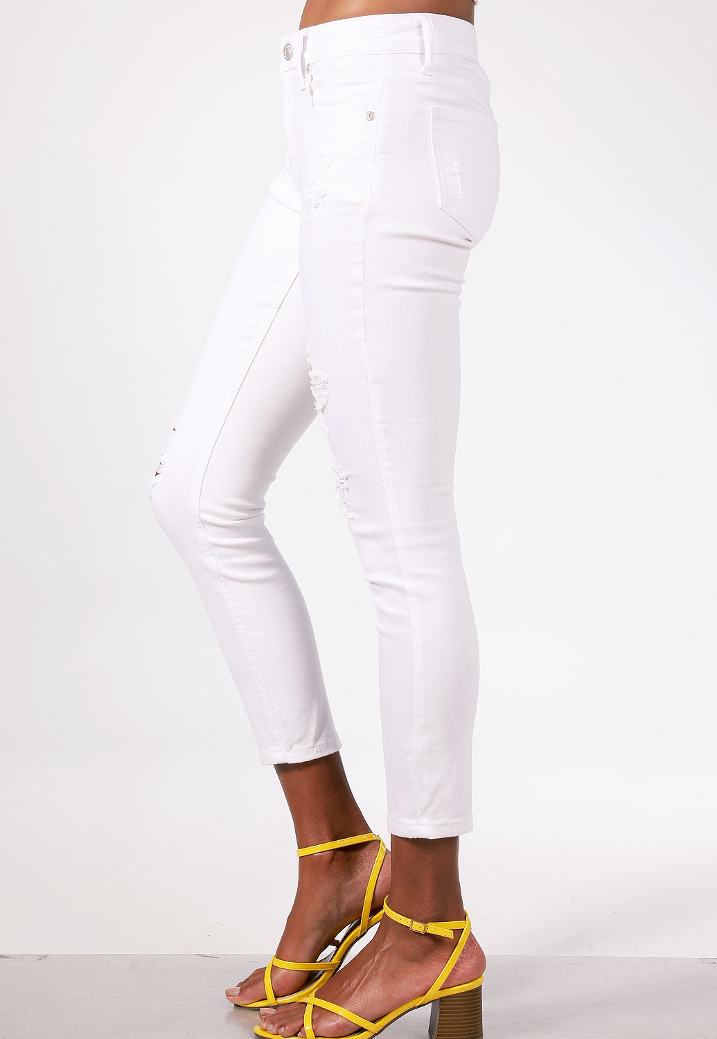Mid Rise Rise Distressed Skinny Jeans